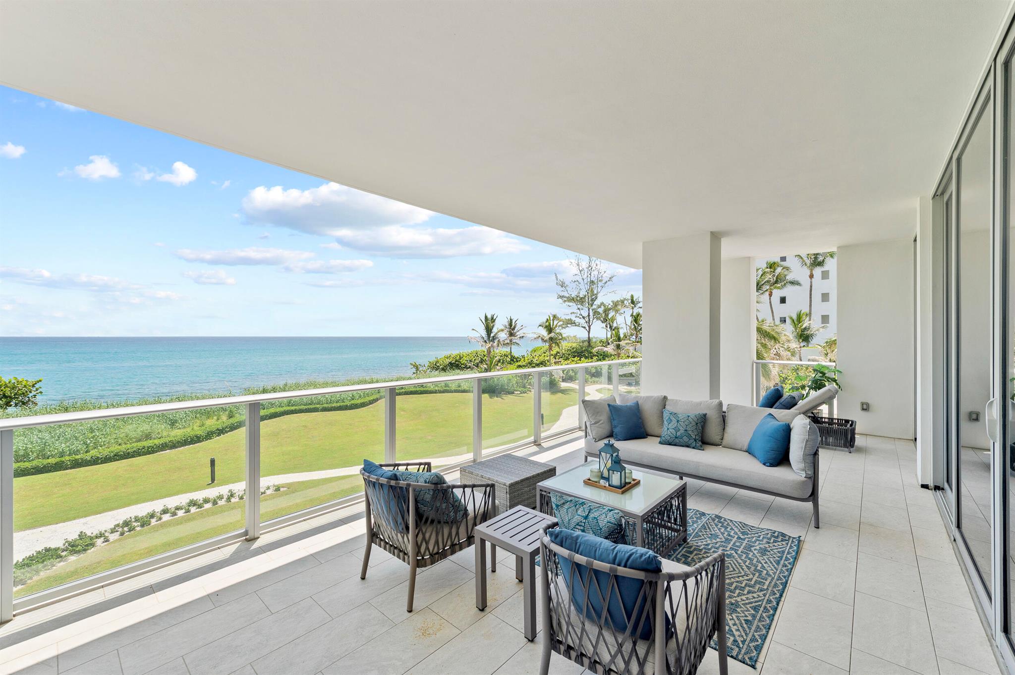Experience oceanfront living at its finest in one of the Palm Beaches most exclusive boutique buildings- 5000 North Ocean. Built in 2020, 5000 consists of just 48 residences located directly on the sand awarding its residents with 340' of pristine private beachfront.With ocean views from every room, enjoy the hues of blue Singer Island is renowned for from this direct ocean two bedroom + den residence. After entering the private foyer via an accessed controlled elevator, you're welcomed with vistas of the Atlantic and a true chefs kitchens featuring gas Thermador appliances, a walk-in pantry, quartz countertops and custom cabinetry. The primary suite features a 5 piece spa bathroom with an over-sized walk-in closet. The secondary bedroom has an en-suite bathroom and walk-in closet.