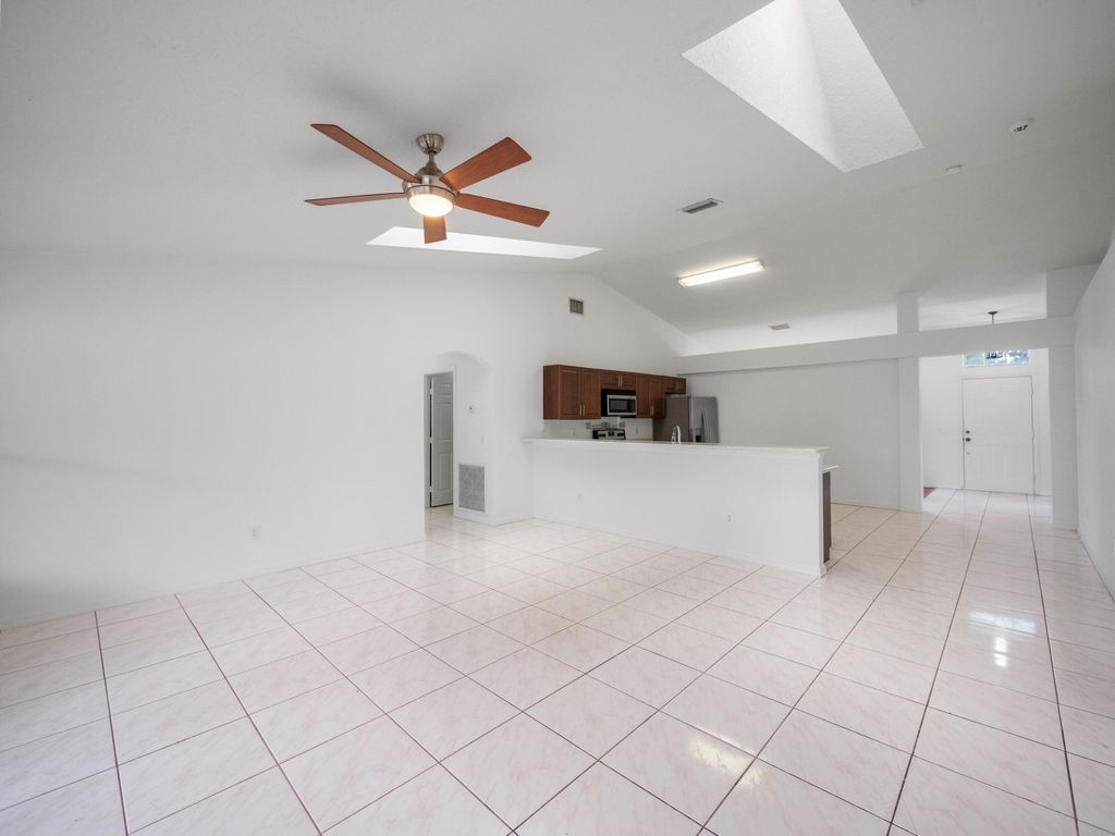 Photo of 949 SE Bywood Avenue, Port Saint Lucie, FL 34983 (MLS # B26013153)
