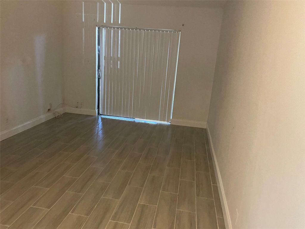 Photo of 4164 Lakeside Drive, Tamarac, FL 33319 (MLS # F10432258)