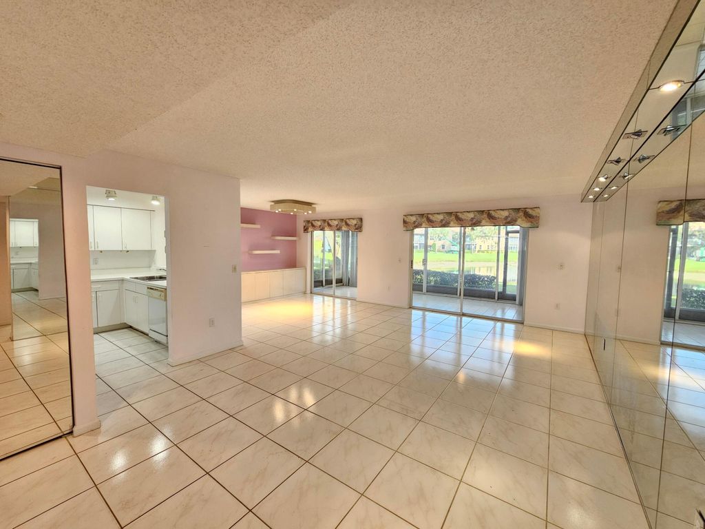 Photo of 9963 Seacrest Circle #101, Boynton Beach, FL 33437 (MLS # R11159062)