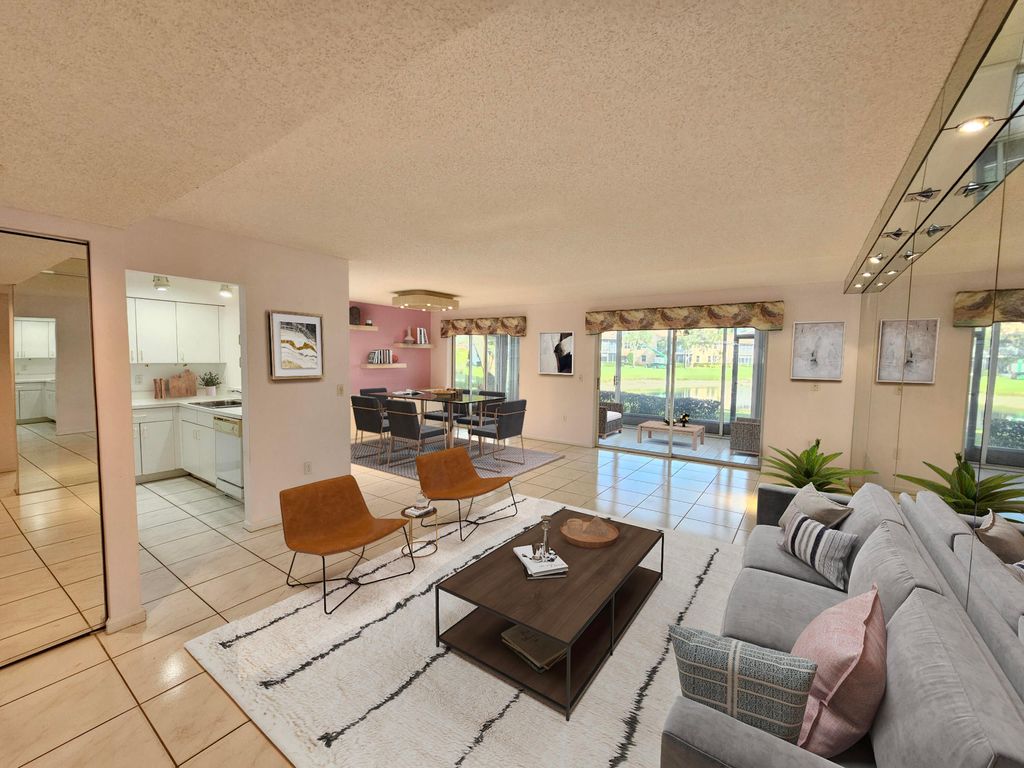 Photo of 9963 Seacrest Circle #101, Boynton Beach, FL 33437 (MLS # R11159062)