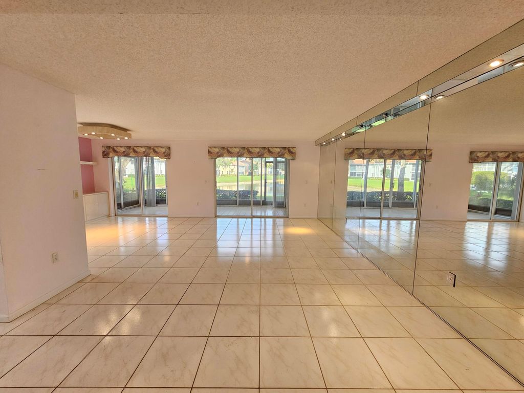 Photo of 9963 Seacrest Circle #101, Boynton Beach, FL 33437 (MLS # R11159062)