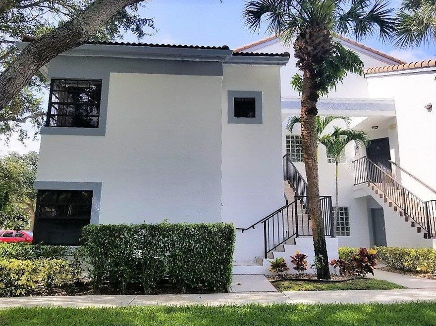 This 1st floor corner unit,  spacious 3 Bedroom, 2 Bath condo is perfect for full-time living or luxurious escapes from the winter doldrums! You will be easily impressed by the large open concept floor plan with plenty of natural light through-out the home! Enjoy and relax in the covered screened patio and the fantastic garden view! When your evening comes to an end, retreat to the privacy of your room.  Resort-Style Living, with an amazing clubhouse and an array of amenities that are in walking distance from this home the newly renovated clubhouse is stunning! If you have not visited, you need to. Café opens for breakfast and lunch / card rooms / fitness center in a solarium overlooking the pool area. Relax in one of the satellite pools or at the enormous main pool and spacious sundeck. Several tennis courts and handball courts for your enjoyment as well. With shows and a variety of clubs, you will never be bored!