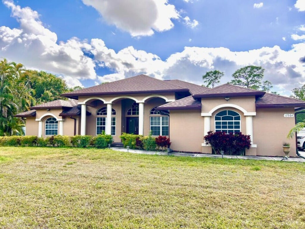 Photo of 17564 79th Court N, The Acreage, FL 33470 (MLS # R11068229)