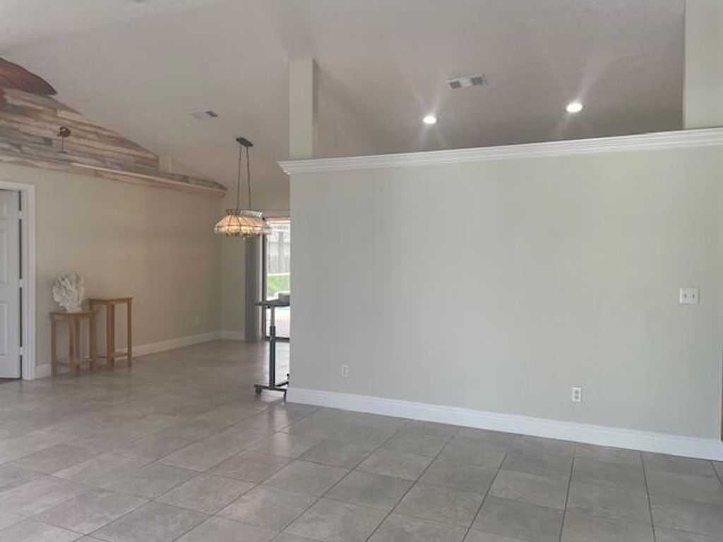 Photo of 618 SE Streamlet Avenue, Port Saint Lucie, FL 34983 (MLS # R11120259)