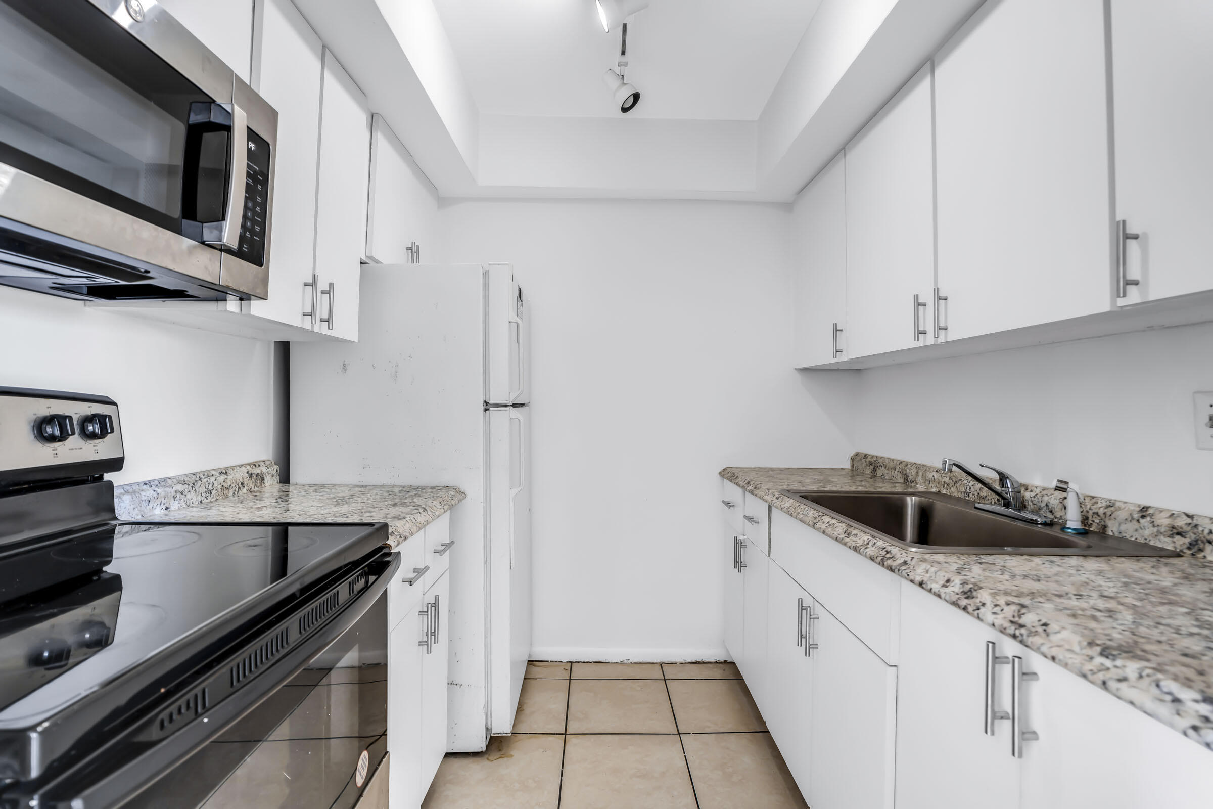 VILLAGE AT DADELAND CONDO - Residential