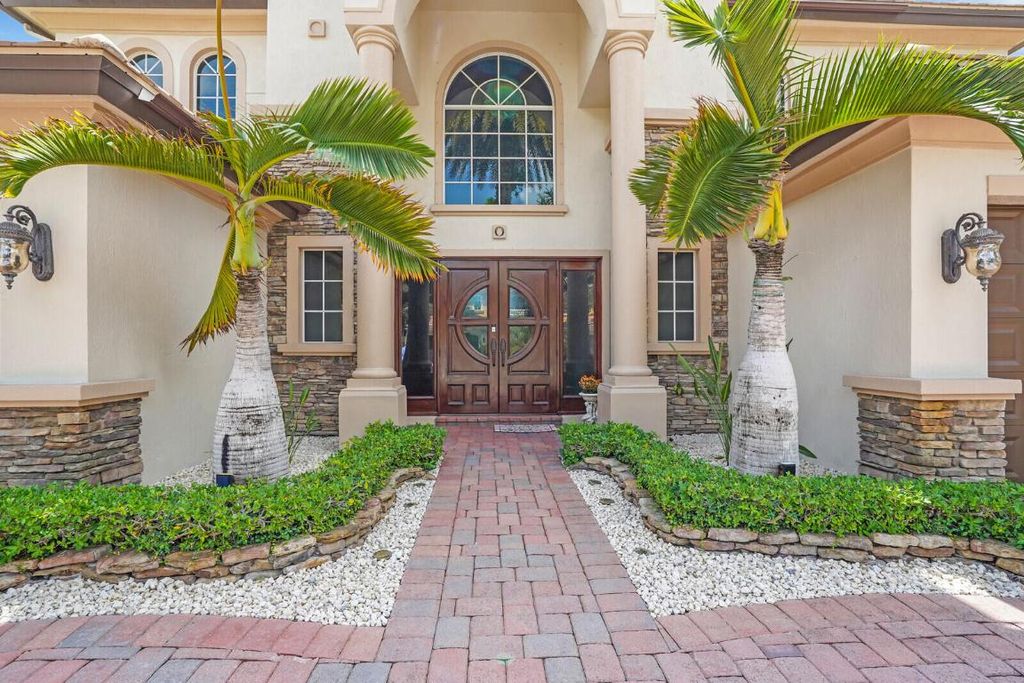 Photo of 718 Edgebrook Lane, West Palm Beach, FL 33411 (MLS # R11098816)