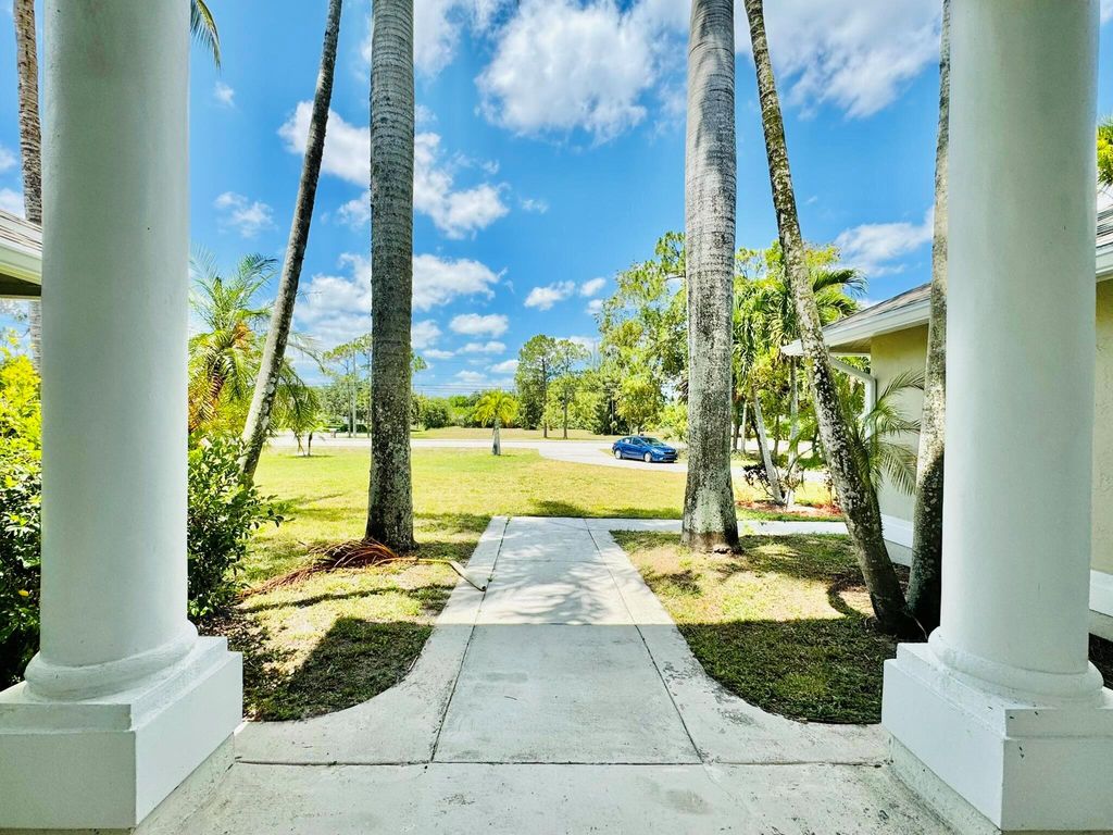 Photo of 6174 Royal Palm Beach Boulevard, West Palm Beach, FL 33412 (MLS # R10981249)