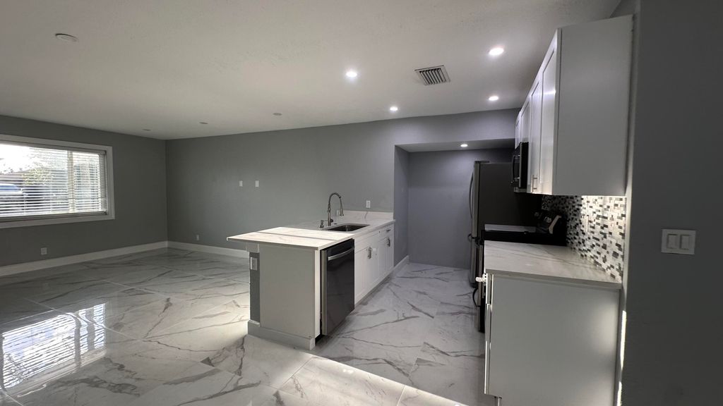 Photo of 1134 Woodbine Road, West Palm Beach, FL 33417 (MLS # B26020588)