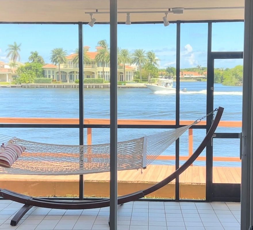 Welcome to your fully furnished /turnkey waterfront rental home. Short term rental availability. This ground floor 2/2 sits right above water level on the Intracoastal Waterway. Very exciting! Like living on a YACHT (almost). Located about a quarter mile north of the Banana Boat & Two Georges ( for you boaters) on the Intracoastal in Boynton Beach and 10 minutes from Atlantic Av Delray Beach. This tastefully decorated Turn-Key rental has in unit Washer/Dryer, 1 assigned parking space, full storm protection. All almost new appliances and kitchen, HD Flat Screen TV's. Come live here and enjoy the waterfront lifestyle.