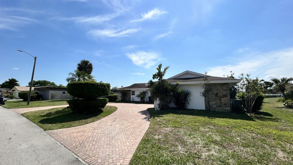 Photo of 5728 S Bayberry Lane, Tamarac, FL 33319 (MLS # B26007717)