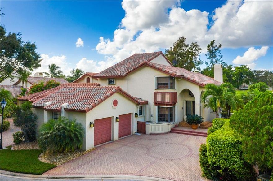 Updated Mediterranean Villa with million dollar view of golf course, canal, & maintained yard. Entry opens to cozy living room with expansive ceiling heights & fireplace, breathtaking views, natural light. Family room with French doors opens to screened porch, outdoor patio & garden. First floor bedroom (currently used as office), 2 bedrooms upstairs (one is enormous Master Bedroom with sitting area, shutters & French doors to second-level balcony for gazing at view, stars & relaxing). A bonus room downstairs for gym, nursery or craft room. Situated on cul de sac in guard-gated golf course community (no mandatory membership). All bathrooms recently remodeled, 2 with onyx. Kitchen has view, center island with storage, granite countertops, oak cabinets, broom closet & HUGE panty.