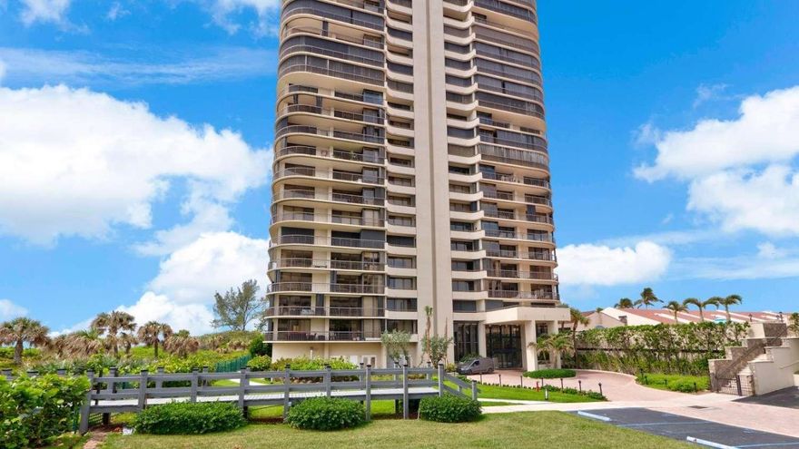 This spacious two bedroom apartment is located at 4000 N. Ocean Dr. at the grand Martinique complex in the East Tower.

Upon entering the beautiful lobby of this building you will be greeted by a concierge who is there to meet all of your needs. The lobby of the East Tower features a magnificent spiral staircase which leads you to the second floor which features two large swimming pools, Tennis courts, a fully equipped fitness center and the Le Club Restaurant which is available to the residents of the Martinique complex. A path to the beautiful beach makes the ocean easily accessible to the residents.

This desirable apartment is located on the 9th floor of the east tower. Each floor in this building accommodates only four units. This unit offers beautiful views of both the ocean and intercostals' water way.  All of the glass windows including the sliding doors that lead you to the three balconies are constructed with high impact hurricane glass.

The Living Room

Large windows surround this 19' x 22' room. It has been partially carpeted over the beautiful marble tile. Crown molding adds a lovely touch to this great room. The room includes exits onto balconies that provide views of both the ocean and the intercostals' water way.
A 15' x 12' dining area adjoins this room and is available for fine dining.

The Master Bedroom

This 19' x 15' master bedroom is carpeted and has sliding glass doors that exit onto a balcony with views of the ocean and the intercostals' water way. The room features his and hers bathrooms which include granite counter tops, single basin sinks, walk in showers and glass double doors tiled to the ceiling. Her bath is also enhanced with an extended tub, granite counter tops and custom cabinetry.
The Guest Bedroom

This 16' x 13' room has been carpeted and offers a seating area with views of the intercostals' water way. The bedroom features large closets, a bath that is tiled, a single sink, granite counter tops and a large glass two way door. Fine cabinetry completes this guest room.

The Kitchen

This 13' x 8' Galley features a trey ceiling, marble tile, granite counter tops, a mosaic 1" tile back splash, upgraded cabinetry which provides plenty of storage, a full set of appliances and an eat in breakfast area with views of the ocean.