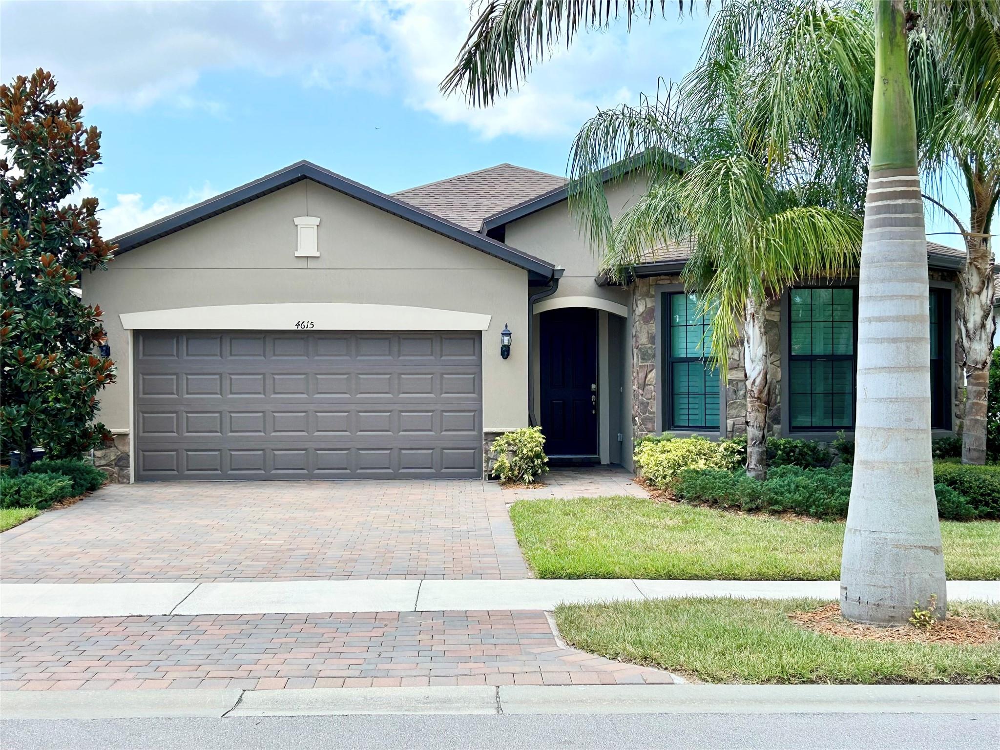 Turnkey 3BR/2BA CBS home in Magnolia Court with 1,691 sq. ft., 2-car garage, and $65K+ in upgrades. Built in 2021, it features impact glass, plantation shutters, quartz countertops, and ceiling fans throughout. Enjoy indoor-outdoor living via a 3-panel patio slider to an extended screened lanai. Front views of park, Pickleball, and Bocce. Stone elevation, roller shades, new A/C (2024). Just 10 mins to beach, near dining/shopping. Move-in ready! **Seller is a licensed real estate agent.