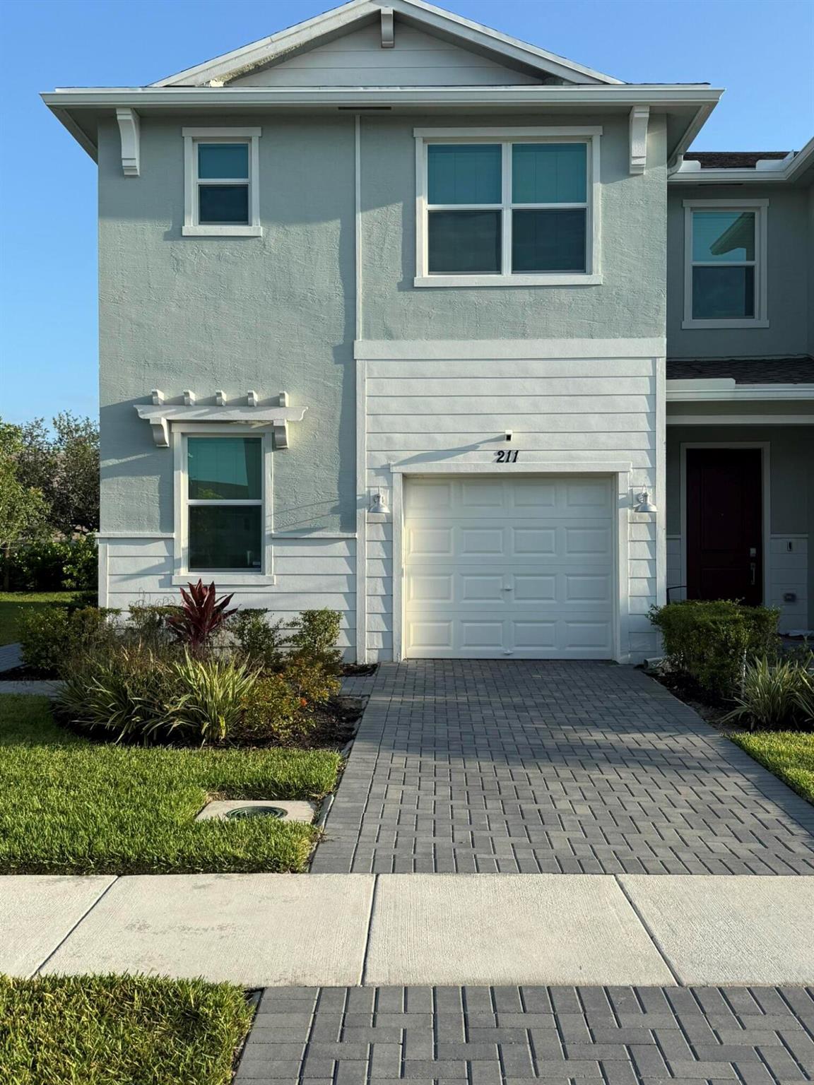 Welcome to this charming home located in Port Saint Lucie. This well-maintained property features three spacious bedrooms and two bathrooms plus a first floor den/office and half bath. Enjoy the open floor plan with a bright living area leading to a modern kitchen equipped with stainless steel appliances. Blinds and ceiling fans installed across the home. All pavers have been sealed and Garage floor has been professionally coated. Situated in a quiet neighborhood with easy access to local amenities, I-95 and the Turnpike, this home provides a comfortable and convenient living experience.