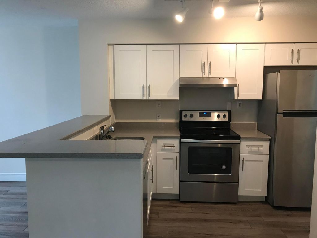 Photo of 7896 Sonoma Springs Circle #101, Lake Worth, FL 33463 (MLS # B26045419)