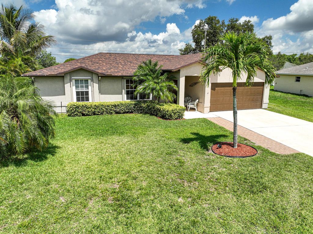 Photo of 567 SW Nagle Place, Port Saint Lucie, FL 34953 (MLS # R11012563)