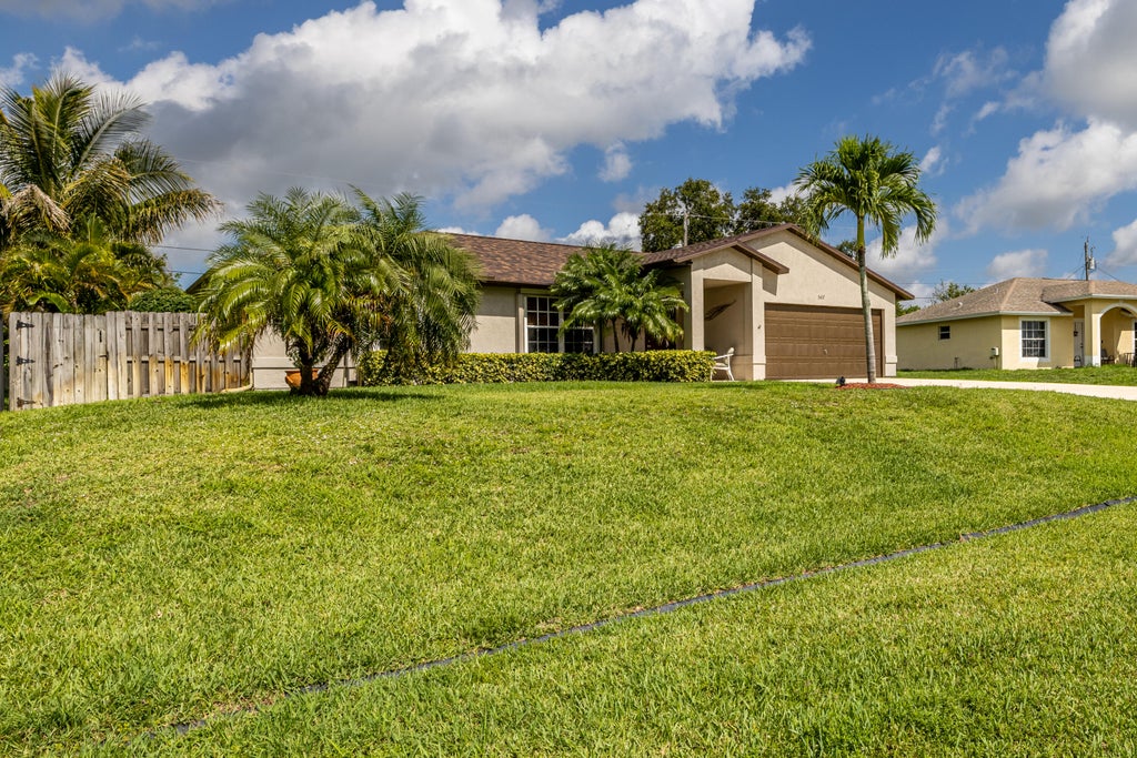 Photo of 567 SW Nagle Place, Port Saint Lucie, FL 34953 (MLS # R11012563)