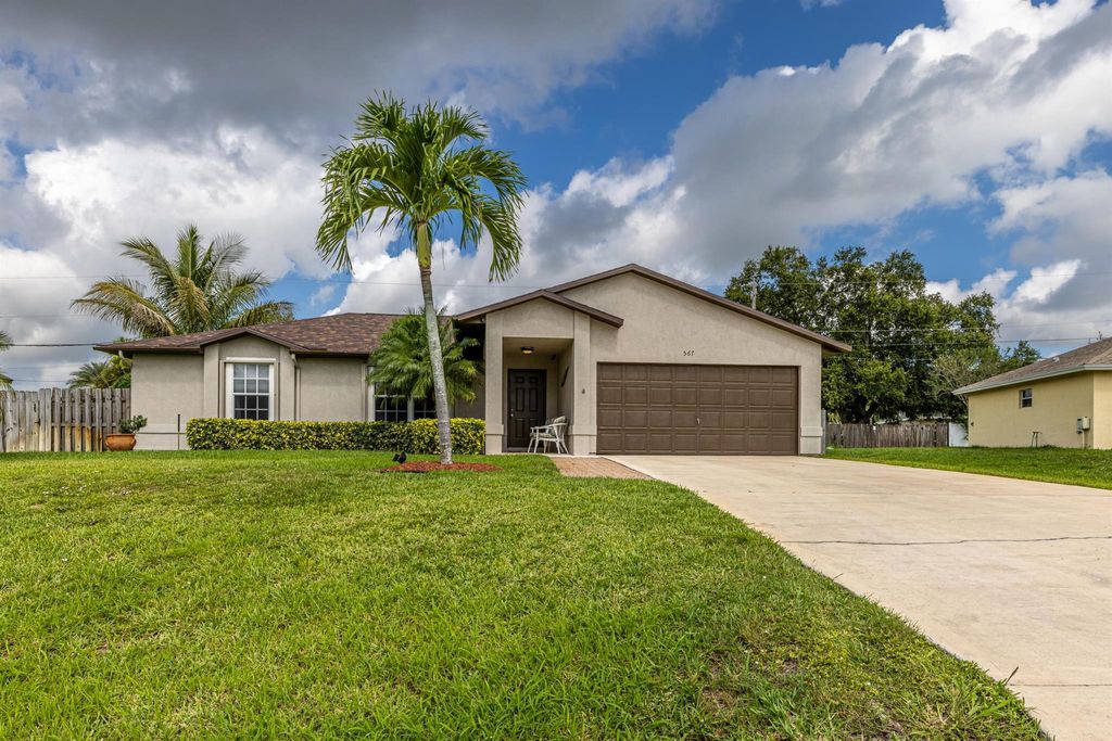 Photo of 567 SW Nagle Place, Port Saint Lucie, FL 34953 (MLS # R11012563)