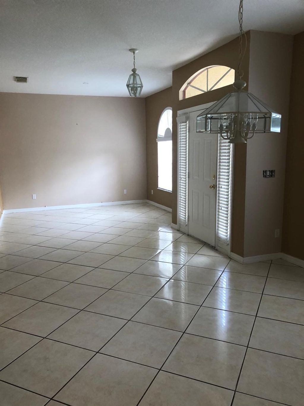 Photo of 381 SE Evans Avenue, Port Saint Lucie, FL 34984 (MLS # R10991257)
