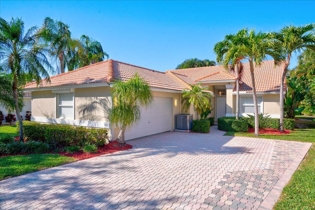 Photo of 5343 Grande Palm Circle, Delray Beach, FL 33484 (MLS # R10961645)