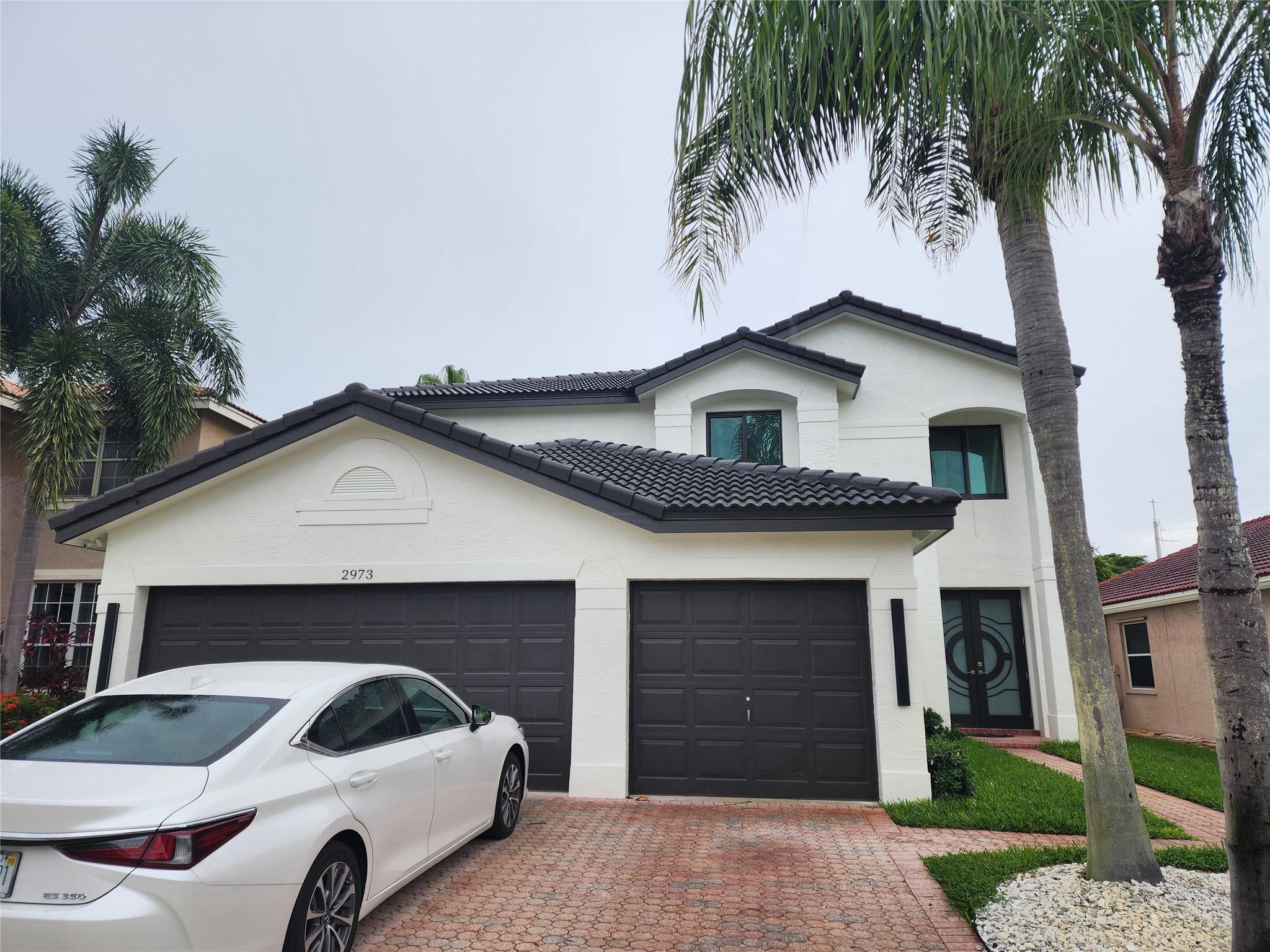 WOW! Stunning fully renovated 5BD/3BA home with 3-CAR GARAGE in prestigious Silver Lakes. EVERYTHING IS NEW! New impact windows, NEW ROOF, new front door, NEW PLUMBING , REMODELED BATHROOMS, NEW modern light fixtures. GORGEOUS NEW PORCELAIN FLOORS on the first floor and NEW Waterproof Vinyl flooring upstairs. FRESHLY PAINTED INSIDE & OUT. Spacious layout with One Bedroom on the First floor perfect for In-Laws or home Office. Prime West Miramar location within walking distance to top-rated A schools, shops, and restaurants. Equal distance to Miami and Fort Lauderdale, and just a short drive to the beach. This HOME is MOVE-IN READY and priced to sell! Call today for your Private Tour!!