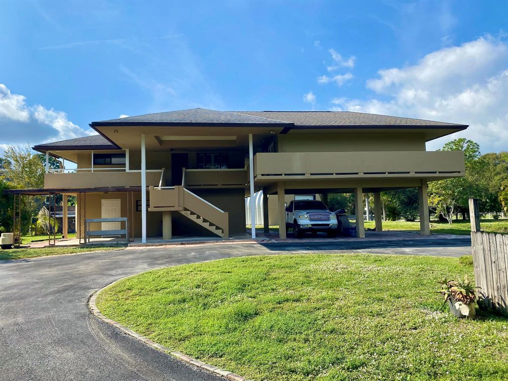 Photo of 13640 153 Road N, Jupiter, FL 33478 (MLS # R11048135)