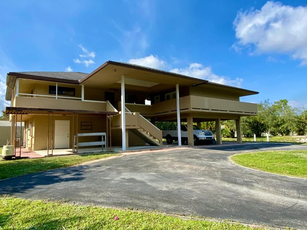 Photo of 13640 153 Road N, Jupiter, FL 33478 (MLS # R11048135)