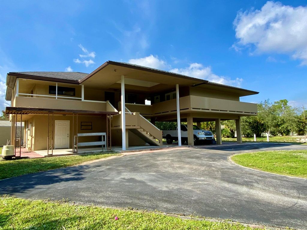 Photo of 13640 153 Road N, Jupiter, FL 33478 (MLS # R11048135)