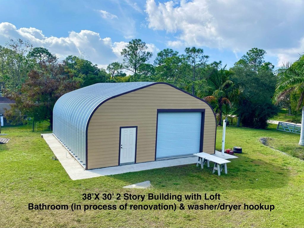 Photo of 13640 153 Road N, Jupiter, FL 33478 (MLS # R11048135)