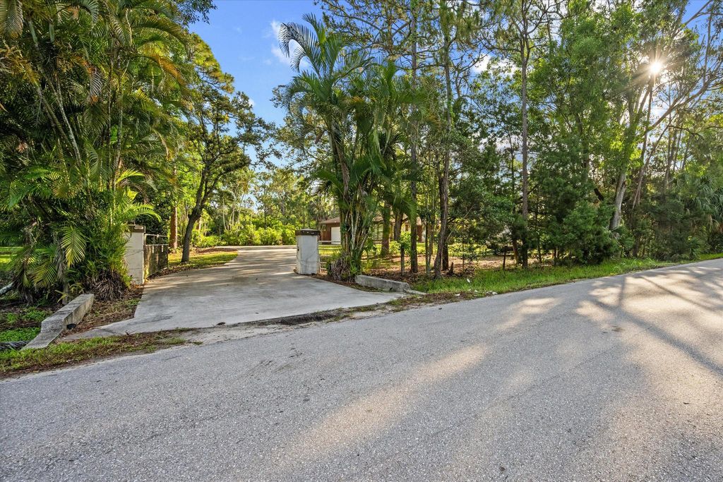 Photo of 12401 174th Place N, Jupiter, FL 33478 (MLS # R11098656)