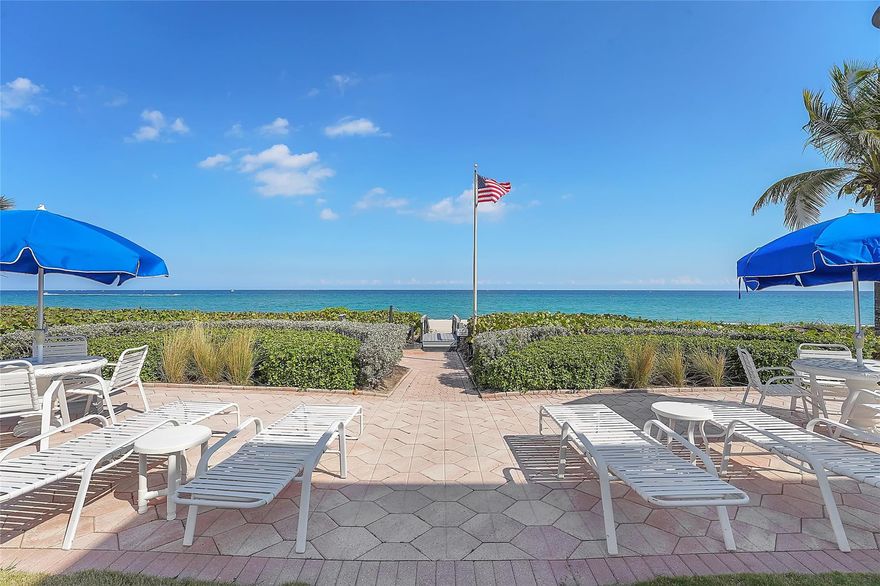 Wake to the rhythm of the Atlantic and unwind with sunset views over the Intracoastal — a rare dual-waterfront lifestyle along the coveted “Magnificent Mile.”This refined two-bedroom, two-bath residence at Virginia Kaye defines elevated coastal living. Private beach access invites effortless mornings by the sea, while sweeping Intracoastal vistas create a stunning backdrop each evening.Beachy-chic interior with clean, tailored finishes. Impact windows frame the views, enhanced by brand-new plantation shutters. Crown molding adds architectural detail, and every space reflects meticulous care. Central AC and recently replaced exterior clear-coated AC. Serene & sophisticated. A private coastal retreat where luxury feels effortless and every day begins with the ocean.