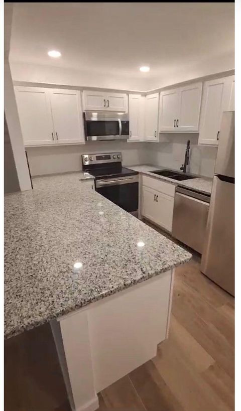 Photo of 1965 SW Silver Pine Way #118 E-1, Palm City, FL 34990 (MLS # B26001283)