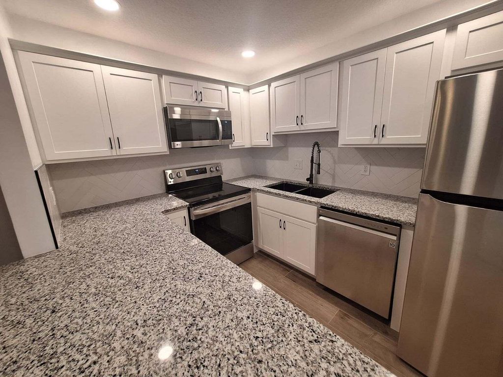 Photo of 1965 SW Silver Pine Way #118 E-1, Palm City, FL 34990 (MLS # B26001283)