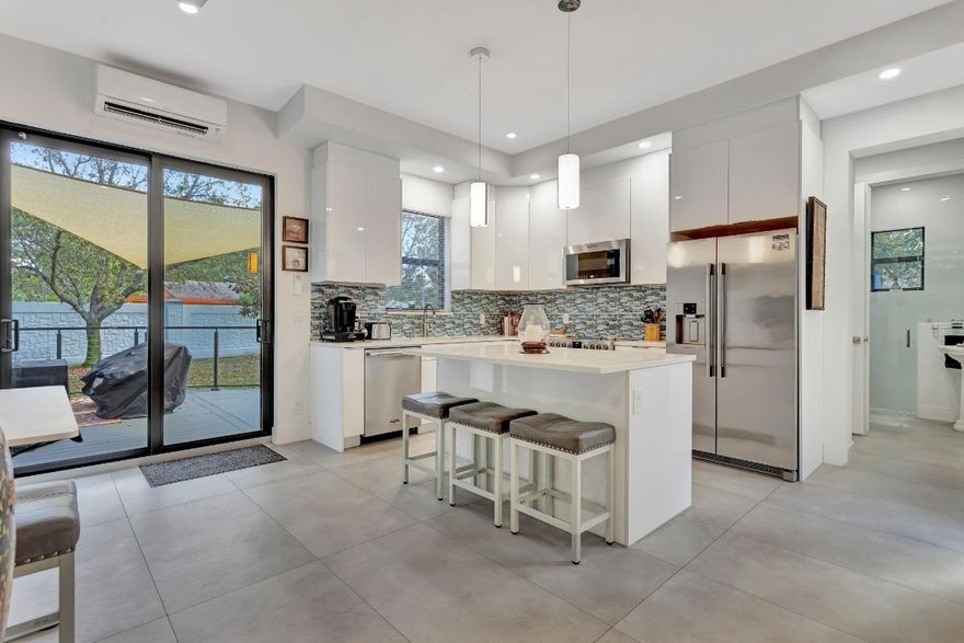 Nestled in the prestigious, all-age, man-gated AZTEC RV RESORT, this premier community offers unparalleled convenience—just minutes from Fort Lauderdale Airport, stunning beaches, world-class dining, shopping, and entertainment.Completed in 2024, this property sits on a spacious 3,843 sq. ft. lot and is designed for ultimate comfort.  It features a full kitchen for effortless entertaining,Two bedrooms, two full bathrooms for ample space,Elegant porcelain tile throughout, Electric storm shutters & screens for added security, and a Private second-floor balcony with a hot tub for relaxation.Enjoy endless seasonal activities in this exclusive resort community, where resort-style living meets the freedom of the open road.  A must-see—schedule your tour today!