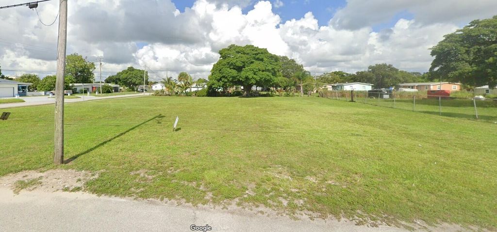 Photo of 1407 N 16th Street, Fort Pierce, FL 34950 (MLS # R11055919)