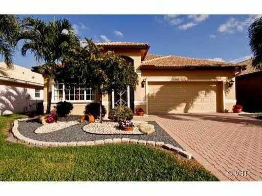 Photo of 13652 Kiltie Court, Delray Beach, FL 33446 (MLS # R11074212)