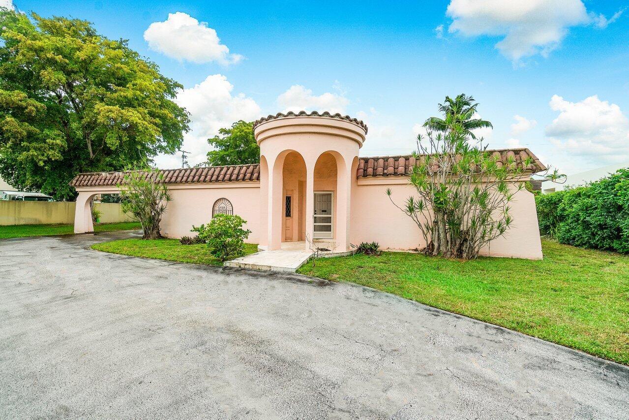 Now presenting 1060 Spanish River Road for sale for the first time in over 40 years, a one of a kind property in the esteemed neighborhood of The Estates of Spanish River Land in Boca Raton. About as close as a single family home can get to the Boca Raton Hotel and Club, walk just a few minutes in the other direction and you're at the beach. In addition to the perfect location, the property also presents a generous oversized lot measuring 1/3 acre, with dimensions of 100x150 providing ample room for potential extensions to the existing home or the opportunity to construct a new masterpiece, with 15,000 square feet of land available for new construction.