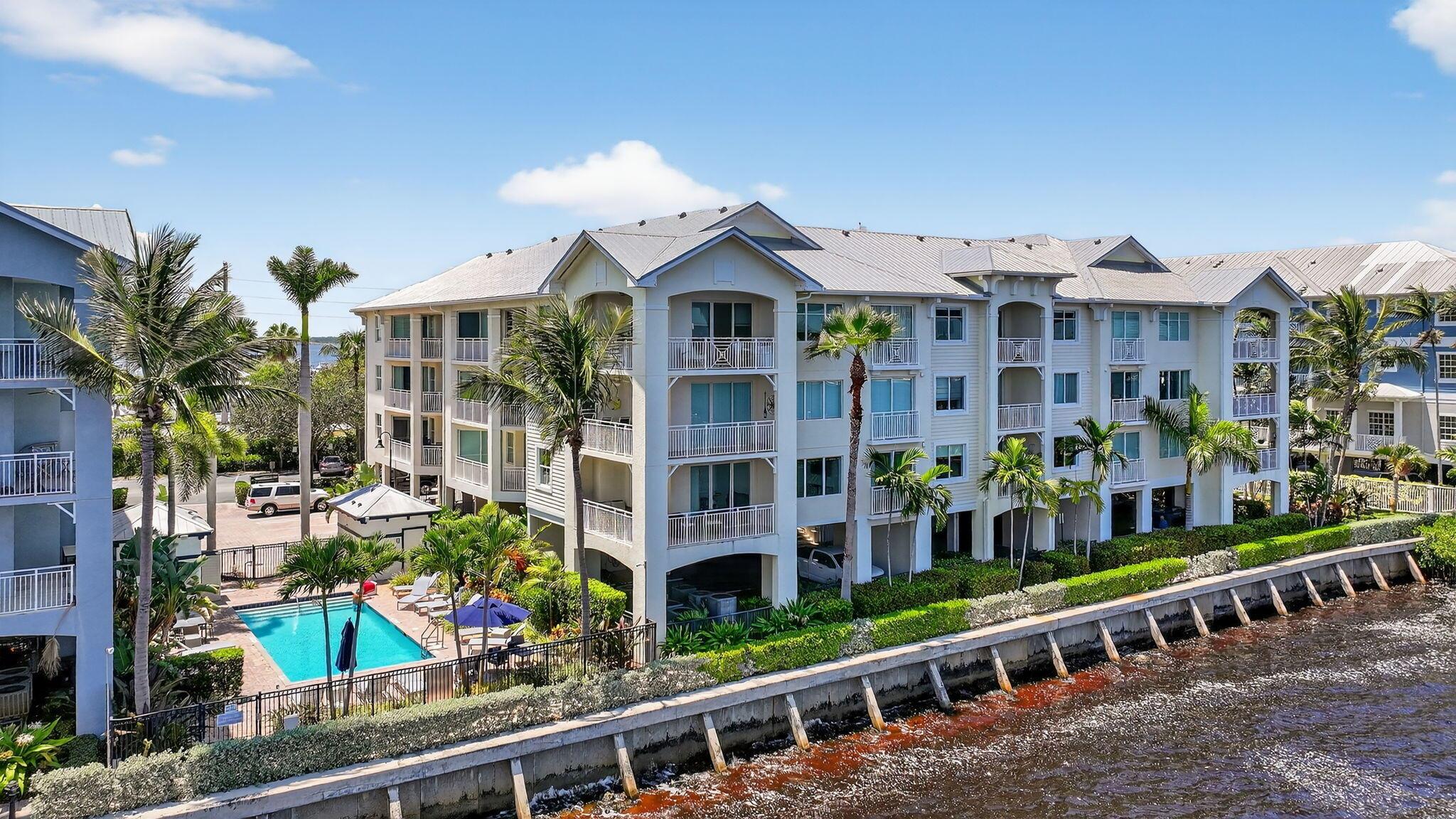 Experience coastal living at its finest in this turnkey 3-bedroom, 2-bath corner condo. This beautifully updated unit features a spacious wrap-around balcony with stunning sunrise and sunset views. Inside, you'll find tasteful upgrades including custom built-ins in all closets, a large walk-in master closet, granite countertops, stainless steel appliances, impact windows, fresh paint, and updated light fixtures throughout. The secure, gated building includes covered parking and elevator access. Enjoy top-tier amenities such as two resort-style pools, a hot tub, clubhouse with a fitness center, sauna, steam room, billiards, poolside cafe and on-site dining at TideHouse and Latitude 26. Boat slips are available for vessels up to 100 feet.
