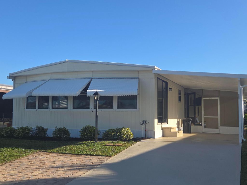 Photo of 7871 SE Shenandoah Drive, Hobe Sound, FL 33455 (MLS # R11152348)