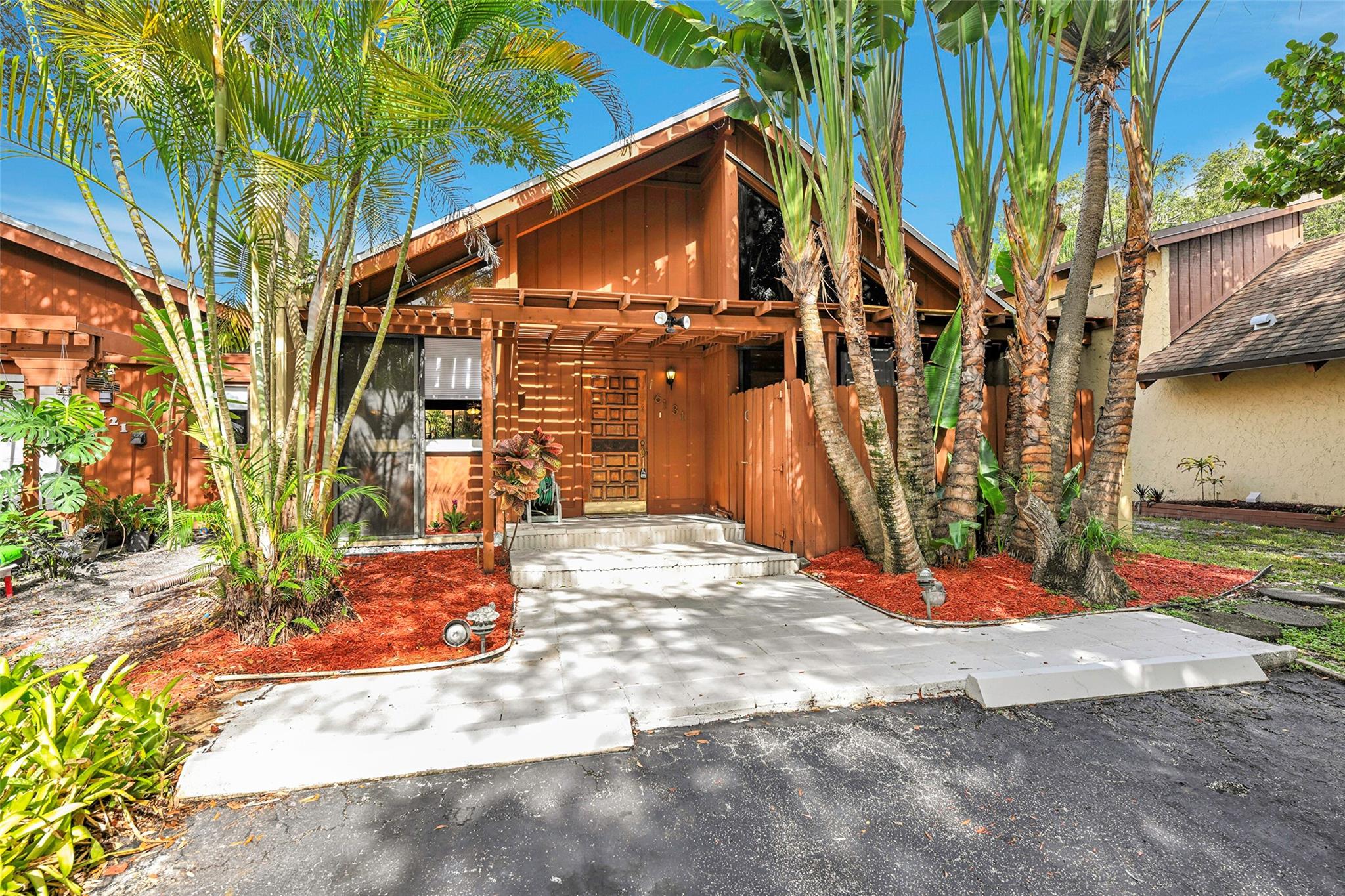 Charming and spacious 3/2, two-story townhome on a corner lot. Features many upgrades throughout, including kitchen and bathrooms, and a new roof. Very low HOA $100/m and prime location close to shopping, beaches, I-95 and Turnpike. Backyard area is private, fenced in and has room for a pool. Property also includes a large attached storage shed and an additional sunroom for your enjoyment.