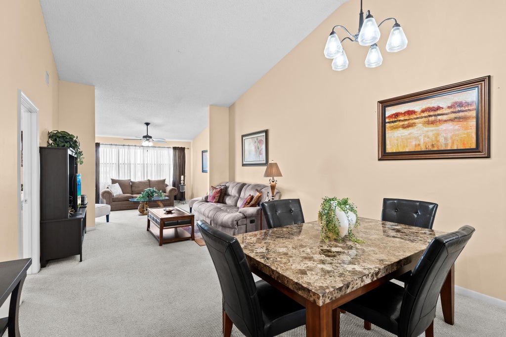 Photo of 7593 Tahiti Lane, Greenacres, FL 33467 (MLS # B26089125)