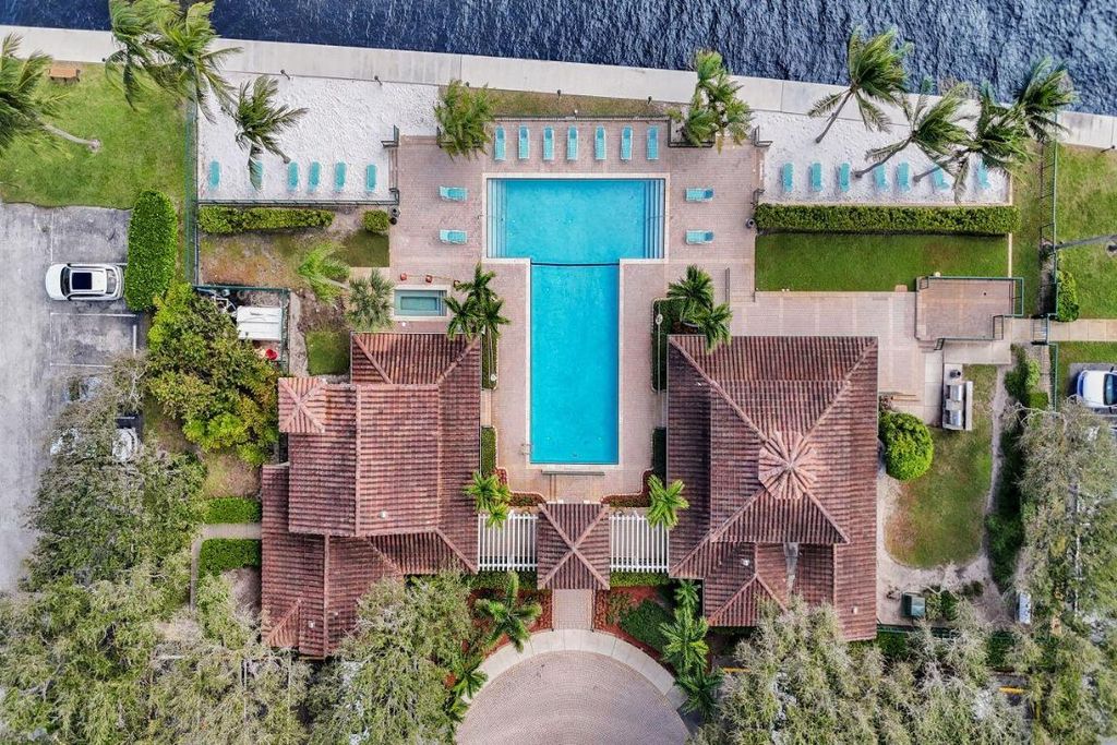 Photo of 1020 Lake Shore Drive #105, Lake Park, FL 33403 (MLS # R11136634)