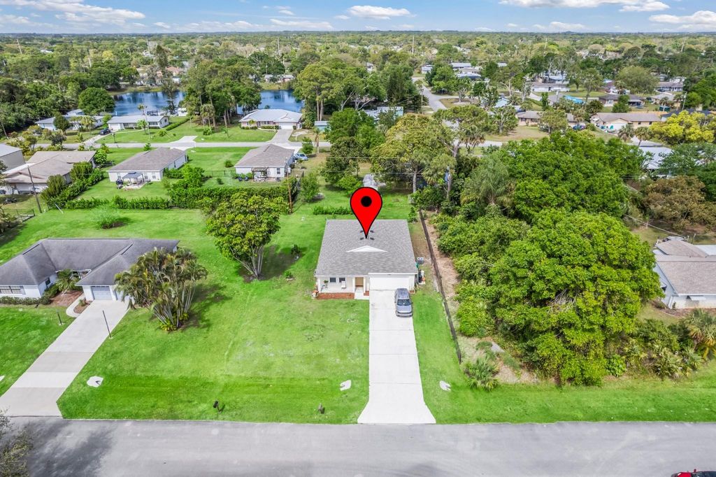 Photo of 7100 Coquina Avenue, Fort Pierce, FL 34951 (MLS # F10490711)