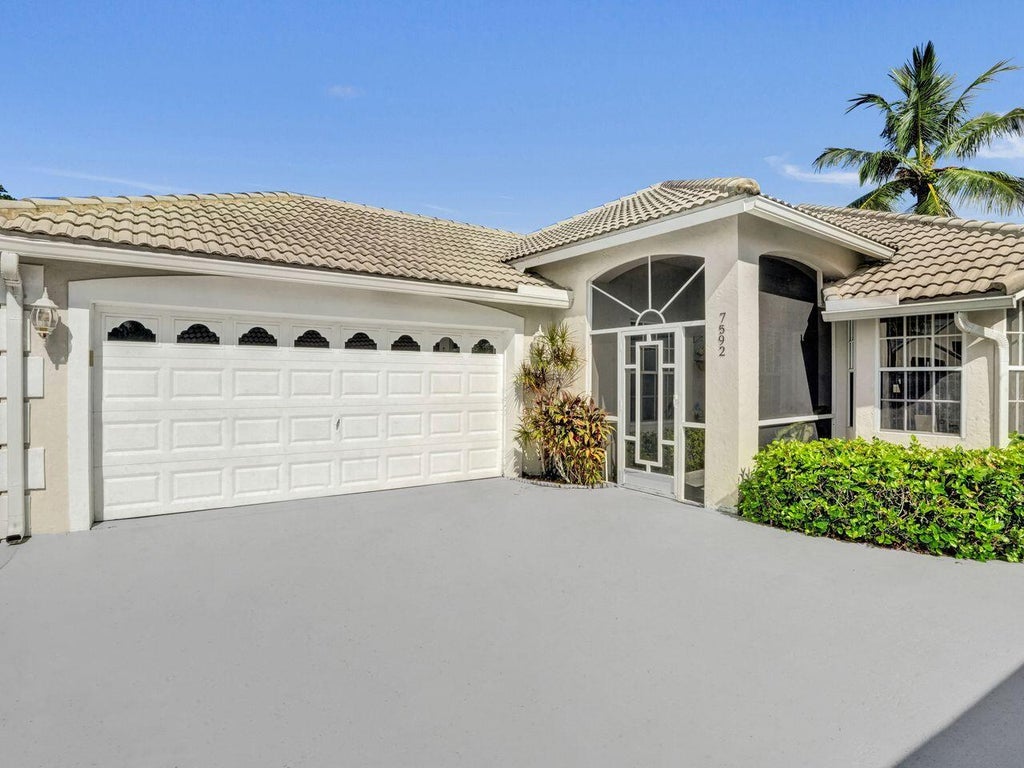 Photo of 7592 Ironbridge Circle, Delray Beach, FL 33446 (MLS # B26072889)