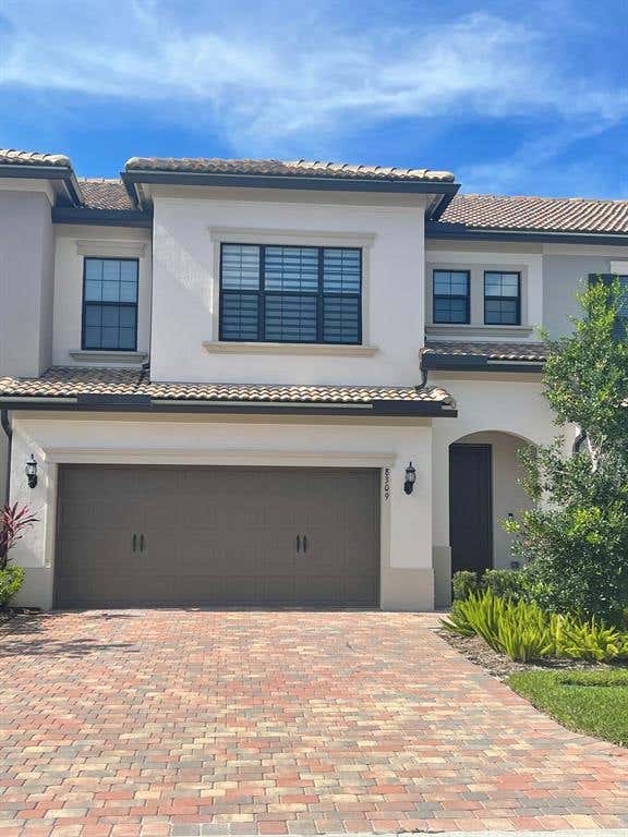 Photo of 8309 Cadre Noir Road Rd, Lake Worth Beach, FL 33467 (MLS # R10737260)