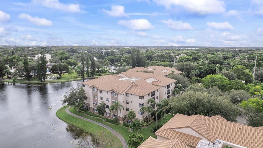 Welcome to this impeccably maintained 3 bedroom, 2 bathroom condo situated on the third floor in the highly desirable Bayport Village. This move-in ready residence features a spacious split-bedroom floor plan with abundant natural light, soaring vaulted ceilings, and fresh interior paint, creating a bright and inviting atmosphere throughout. The home includes a dedicated laundry room with full-size washer and dryer hookups for added convenience. Enjoy relaxing on the private screened-in balcony, perfect for morning coffee or evening breezes. The primary suite offers a generous walk-in closet and an en-suite bathroom with a walk-in shower. Tile flooring extends throughout the unit, providing durability, low maintenance, and a clean, modern aesthetic. Residents enjoy resort-style amenities including a clubhouse, theater, Aquatic Center, fitness center, tennis, pickleball, basketball, racquetball, and more. The monthly maintenance fee includes water, sewer, basic cable, and WiFi. Ideally located just a short walk from the Promenade, offering a variety of shopping, dining, and entertainment options.