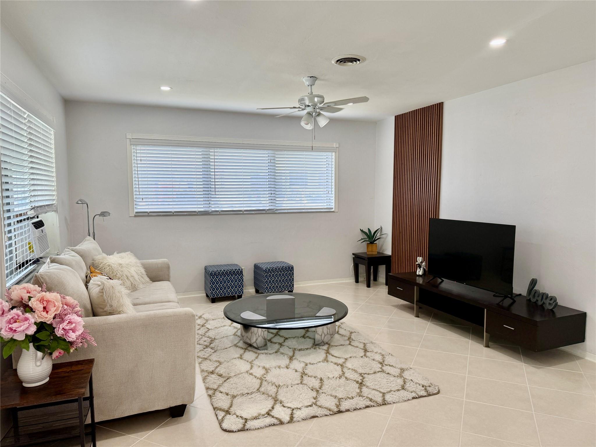 Pompano Beach fully furnished yearly, monthly or seasonal rental. Rates vary based on length of stay. This spacious 1 bedroom, 1 bath unit features a full kitchen and dining area and is turn key with everything you need. Bring your toothbrush & move right in. PETS WELCOME with no breed or size restrictions. No HOA & quick approval. Tile flooring throughout, bedroom with seating area, bathroom with tub, 2 TV's, open living room, fully stocked kitchen w/ all glassware, cooking essentials, silverware & everything you need on a daily basis for all the comforts of home. Laundry room available 24/7 on premises and plenty of parking (work trucks OK). Only 7 units on the premises. Walk to the beach, shopping, restaurants, pickellball, gyms & enjoy everything Pompano Beach has to offer.