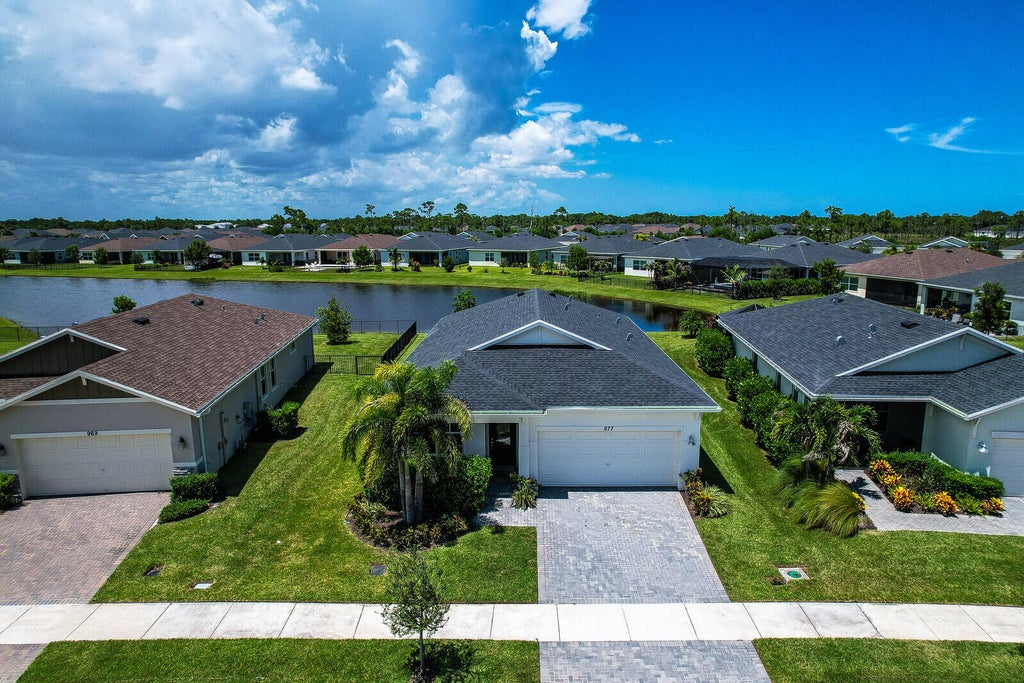 Photo of 977 SE CROSSWOOD Way, Port Saint Lucie, FL 34984 (MLS # B26063832)