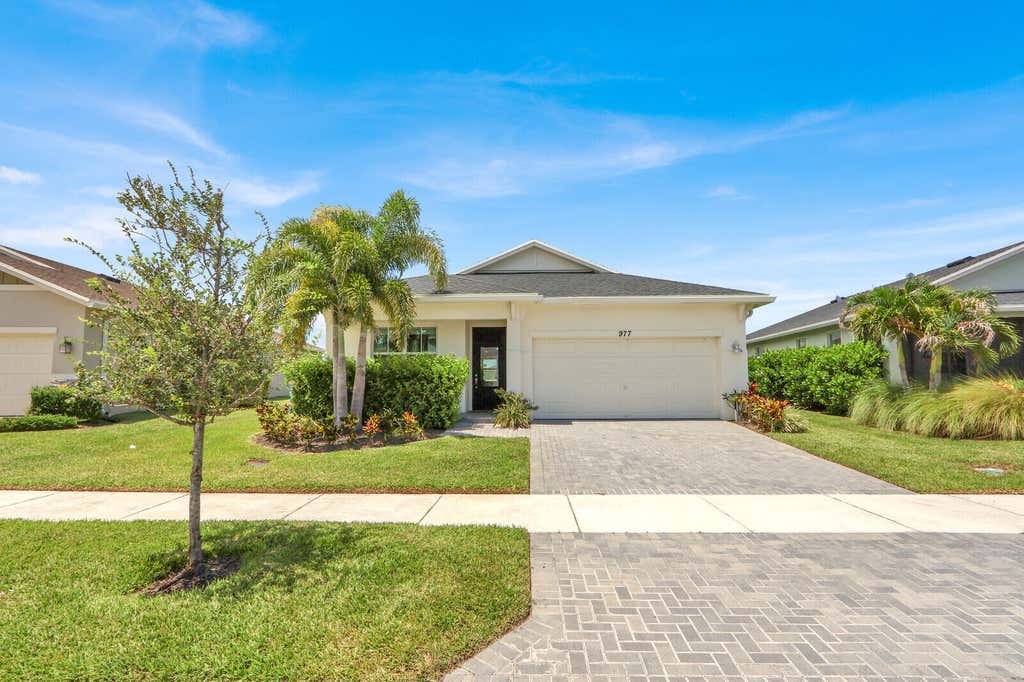 Photo of 977 SE CROSSWOOD Way, Port Saint Lucie, FL 34984 (MLS # B26063832)